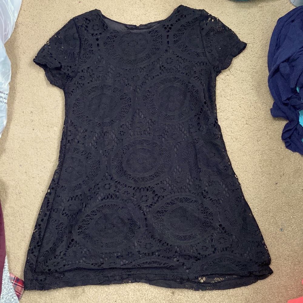Mini black dress with little sleeves. Small size, older but worn a few times